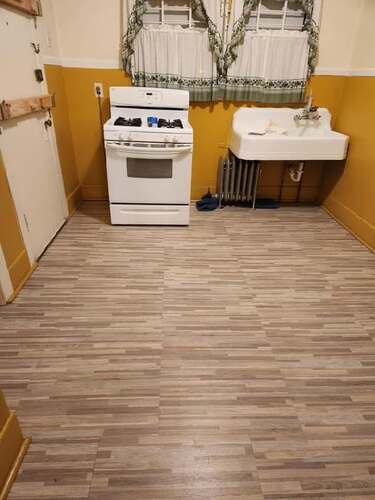 Kitchen floor installation by HWH Contracting LLC in Detroit, MI. Call 313-605-4615 Kitchen floor installation by HWH Contracting LLC in Detroit, MI. Call 313-605-4615